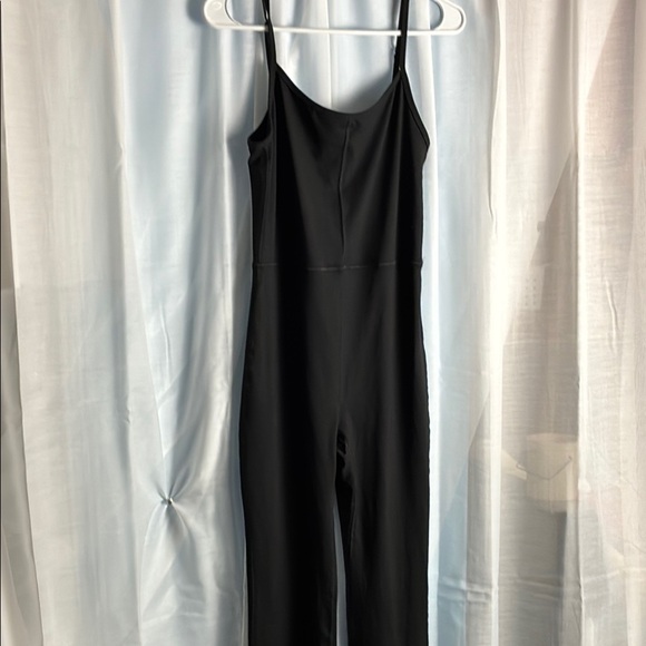 Black Spaghetti Strap Jumpsuit with Form-Fitting Silhouette - Picture 1 of 8